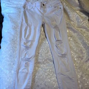 White mid rise ripped jeans